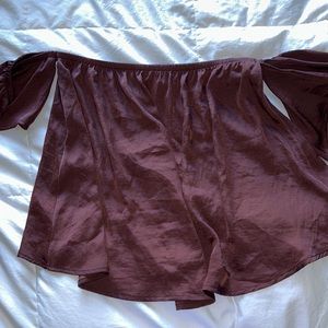 Off shoulder silk top.